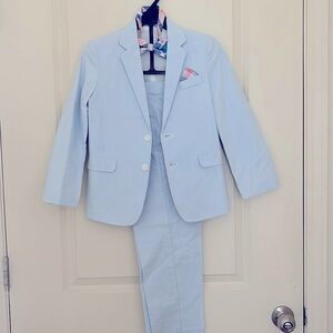 Boy and girl wedding suit and dress.